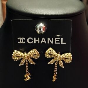 CHANEL Gold Bow Earrings with Pearl Detailing and CC Dangles